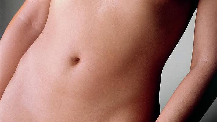Wall Art - Photograph - Front View Of A Woman's Abdomen by Science Photo Library