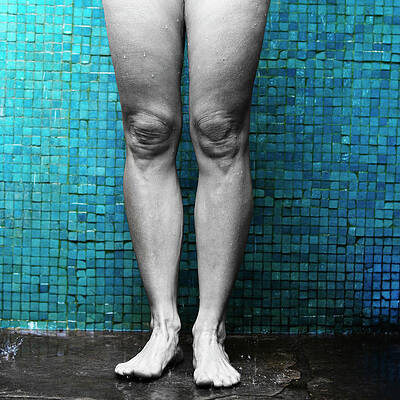 Wall Art - Photograph - Front View Of A Womans Bare Legs by Ron Koeberer