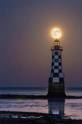 Wall Art - Photograph - Full Moon Over Lighthouse by Science Photo Library
