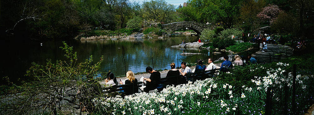 Wall Art - Photograph - Group Of People Sitting On Benches by Panoramic Images