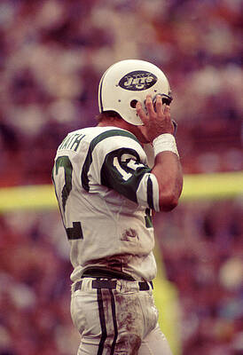 Wall Art - Photograph - Joe Namath Fixing Helmet by Retro Images Archive