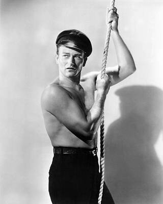 Wall Art - Photograph - John Wayne in Wake of the Red Witch  by Silver Screen