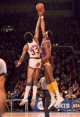 Wall Art - Photograph - Kareem Abdul Jabbar Vs. Wilt Chamberlain Jump Ball by Retro Images Archive