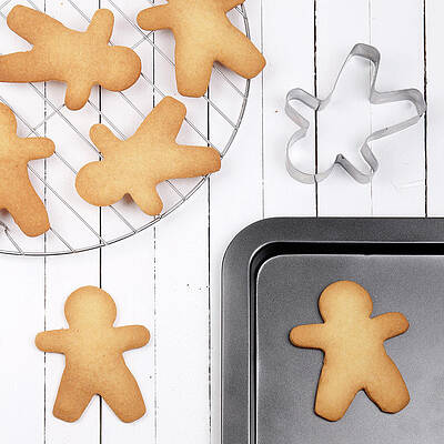 Wall Art - Photograph - Making Cookies Shaped Man by Retales Botijero