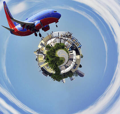 Wall Art - Photograph - Making the World a Smaller Place by Jason Politte