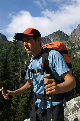 Wall Art - Photograph - Man Hike With Mountain In Background by Heath Korvola