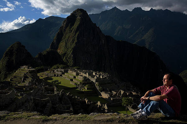 Wall Art - Photograph - Man In Sun At Machu Picchu Peru by Darron R. Silva