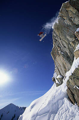 Wall Art - Photograph - Man Jumping A Cliff In Utah by Scott Markewitz