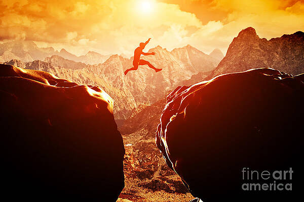 Wall Art - Photograph - Man jumping over precipice in mountains by Michal Bednarek