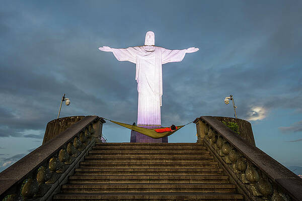 Wall Art - Photograph - Man Resting In Hammock Under Christ by Vitor Marigo