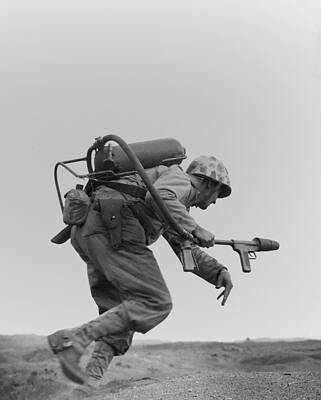 Wall Art - Photograph - Marine With A Flame-thrower, Running by Everett