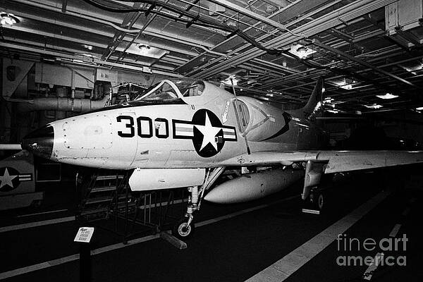 Wall Art - Photograph - McDonnell Douglas a4 A4B Skyhawk on the hangar deck of the Intrepid Sea Air Space Museum by Joe Fox