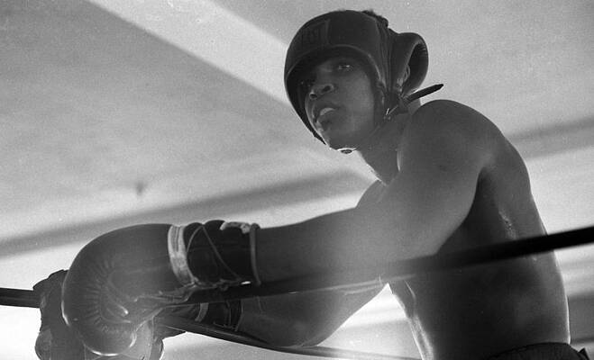 Wall Art - Photograph - Muhammad Ali Gloves Resting On Ropes by Retro Images Archive