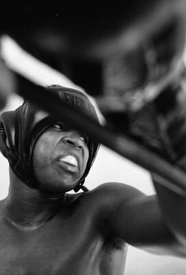 Wall Art - Photograph - Muhammad Ali Looking Sideway Through Rope by Retro Images Archive