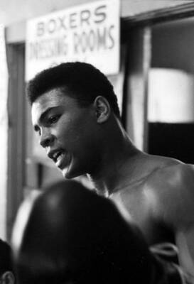 Wall Art - Photograph - Muhammad Ali Talking Outside Of Dressing Room by Retro Images Archive