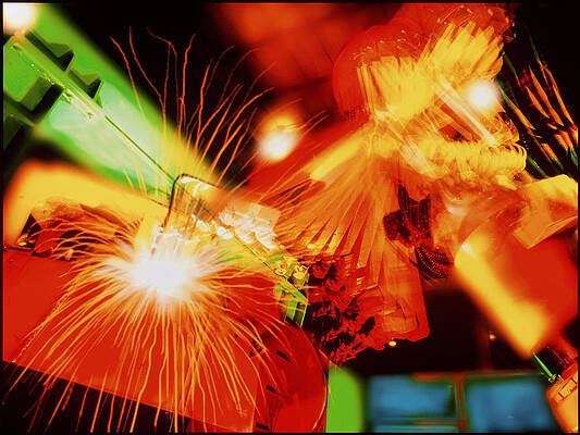 Wall Art - Photograph - Multiple Exposure Image Of Robot Welding Arm by Science Photo Library