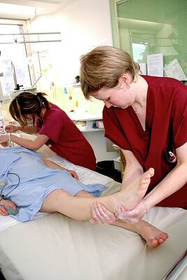 Wall Art - Photograph - Nurses In Intensive Care Unit by Science Photo Library