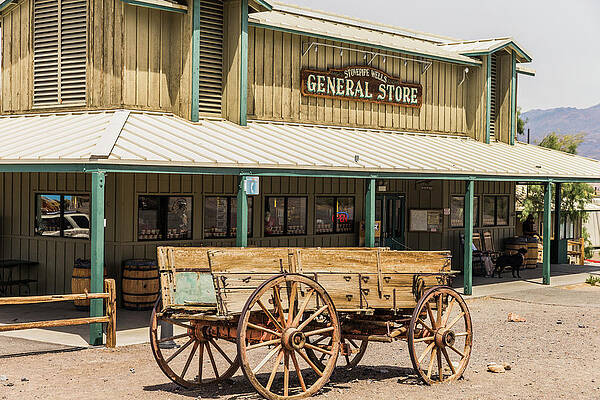 Wall Art - Photograph - Old Wagon Standing In Front Of Death by Ron Koeberer