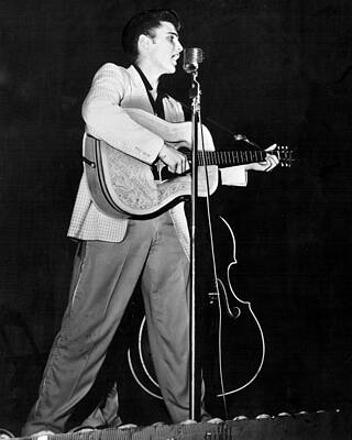 Wall Art - Photograph - On Stage Elvis Presley Plays And Sings by Retro Images Archive