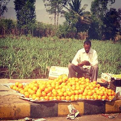 Wall Art - Photograph - Oranges For Sale On The Roadside In by Ankit Jain