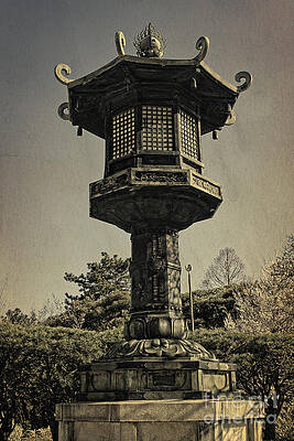 Wall Art - Photograph - Ornate Lamp Post In Front of a Buddhist Temple by Beverly Claire Kaiya