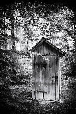 Outhouse in the forest black and white by Matthias Hauser Outhouse in the forest black and white by Matthias Hauser