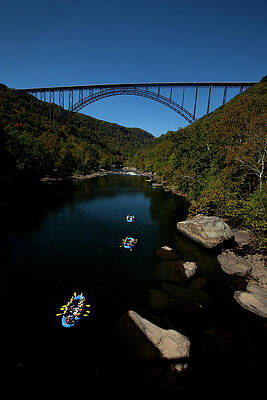 Wall Art - Photograph - Overhead View Of A Raft Full Of People by Trevor Clark