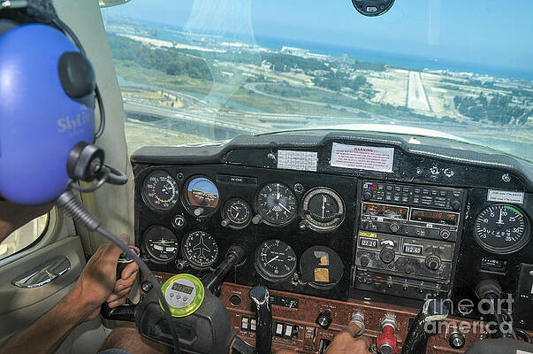 Pilot in Cessna cockpit by Shay Levy Pilot in Cessna cockpit by Shay Levy
