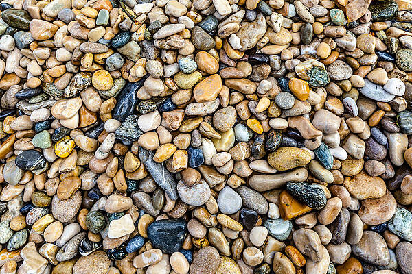 polished stones in a stream by Charles Lupica polished stones in a stream by Charles Lupica