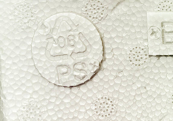 Wall Art - Photograph - Recycling Symbol On Polystyrene by Science Photo Library