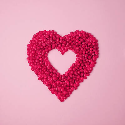 Wall Art - Photograph - Red Cinnamon Candies In The Shape Of A by Juj Winn