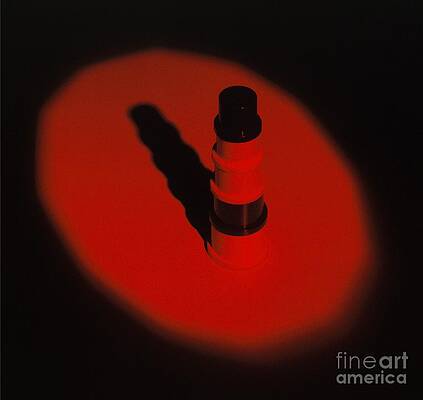 Wall Art - Photograph - Red Light Shining On Object In Dark by Dorling Kindersley