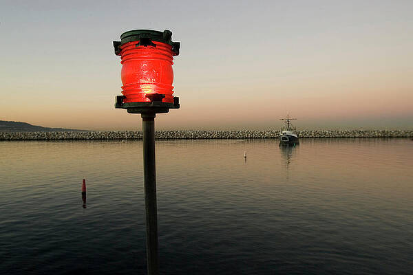 Wall Art - Photograph - Red Navigation Light In A Marina Used by Jose Azel