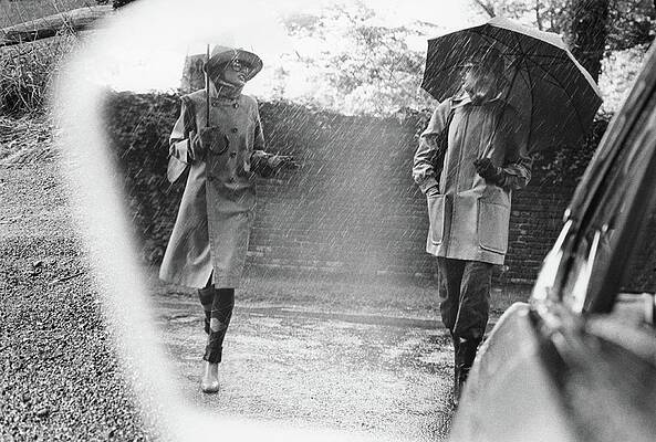Wall Art - Photograph - Reflection In A Wing Mirror Of Models Walking by Kourken Pakchanian