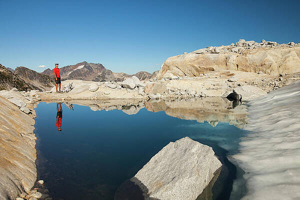 Wall Art - Photograph - Reflection Of A Hiker In A Glacier Fed by Christopher Kimmel