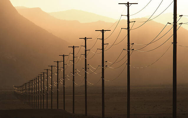 Wall Art - Photograph - Row Of Power Lines At Sunset by Mark Harmel