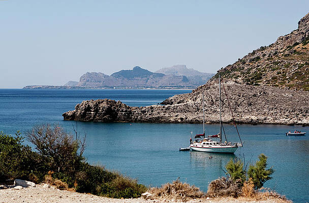 Wall Art - Photograph - Sailboat at Anthony Quinn Bay by Lorraine Devon Wilke
