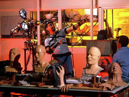 Wall Art - Photograph - Sarcos Android Robot Mimics Movement Of Engineer by Science Photo Library