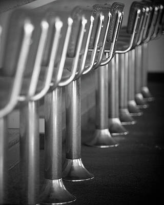 Wall Art - Photograph - Side View Of A Row Of Empty Diner by Ron Koeberer