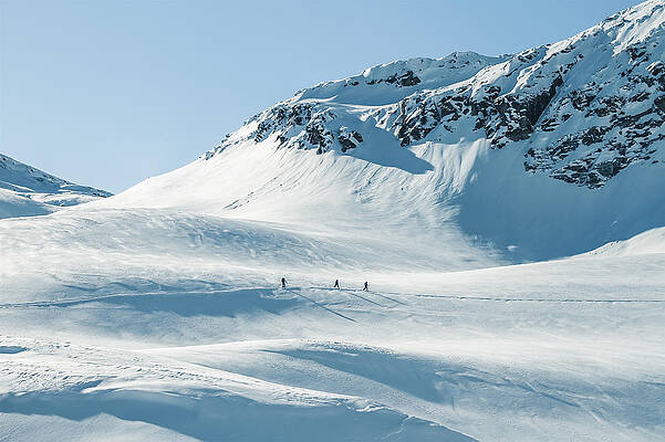 ski tourer on big mountains in a winterlandscape by Leander Nardin ski tourer on big mountains in a winterlandscape by Leander Nardin