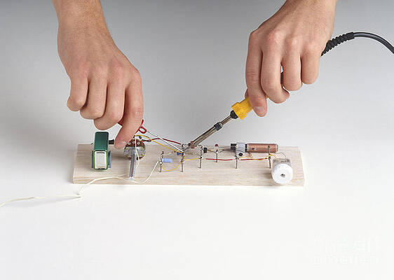 Wall Art - Photograph - Soldering Electrical Components by Dorling Kindersley