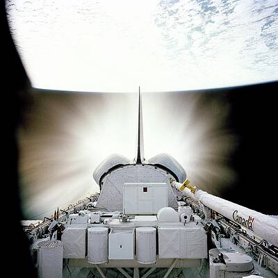 Wall Art - Photograph - Space Shuttle Engines Firing In Orbit by Science Photo Library