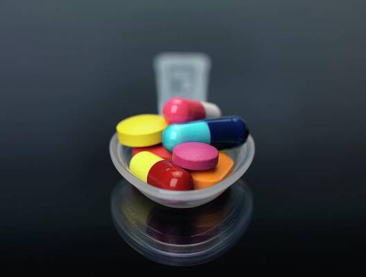 Wall Art - Photograph - Spoonful Of Medicine by Tek Image/science Photo Library