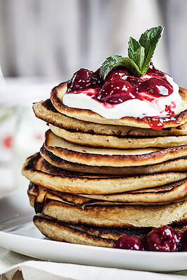 Wall Art - Photograph - Stack Of American Pancakes With Cherry by Westend61