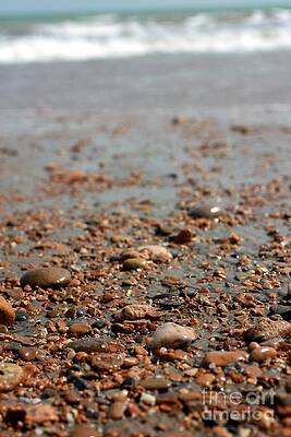 Stones and waves at beach  by Muhammad Junaid Rashid