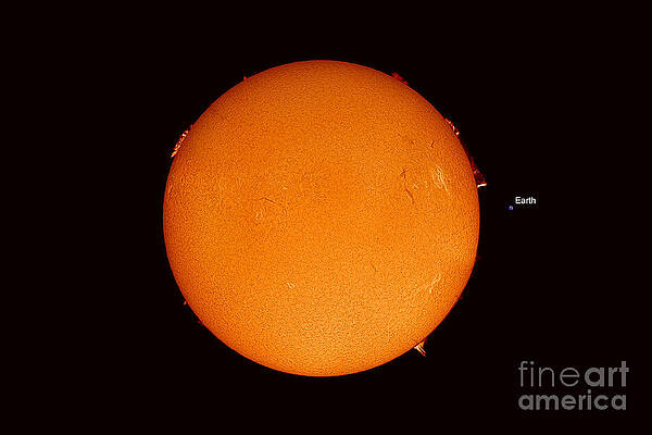 Wall Art - Photograph - Sun With Earth For Size Comparison by John Chumack
