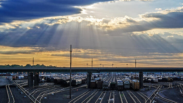Wall Art - Photograph - Sunburst Over The Yards by Kevin Anderson