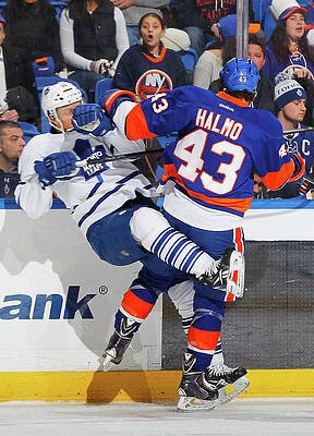 Wall Art - Photograph - Toronto Maple Leafs V New York Islanders by Jim Mcisaac