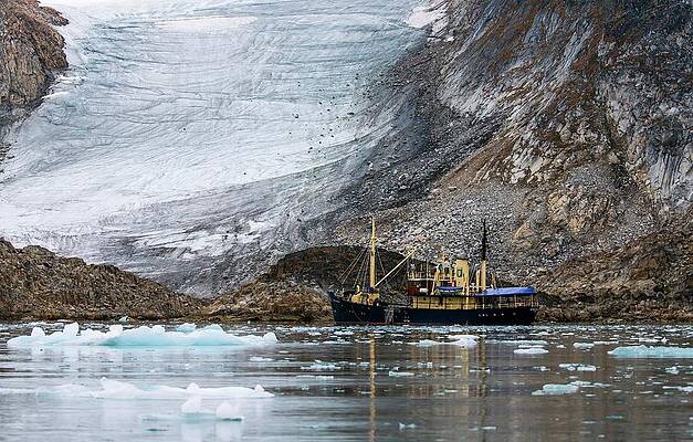 Wall Art - Photograph - Tourist Boat Dwarfed By Glacier Terminus by Science Photo Library