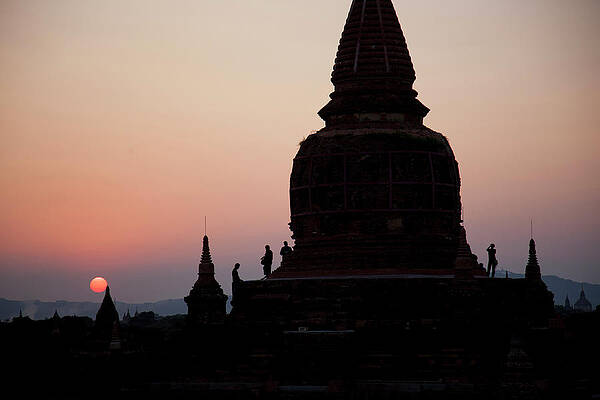Wall Art - Photograph - Tourists Atop A Temples In Bagan by Christopher Herwig